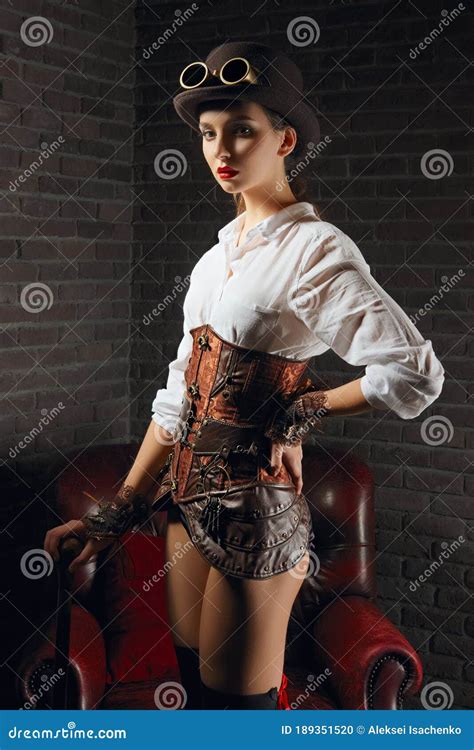 Portrait Of A Beautiful Steampunk Girl In Lingerie And Stockings Hat