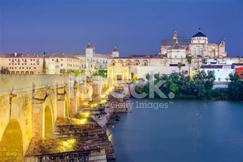 Cordoba, Spain At The Roman Bridge And Mosque-Cathedral Stock Photo ...