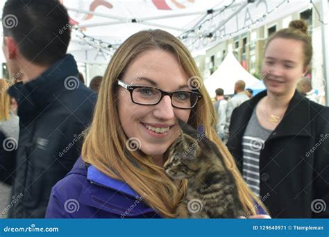 Visitor Interacts with Rescue Kitten from Nashville Cat Rescue at ...