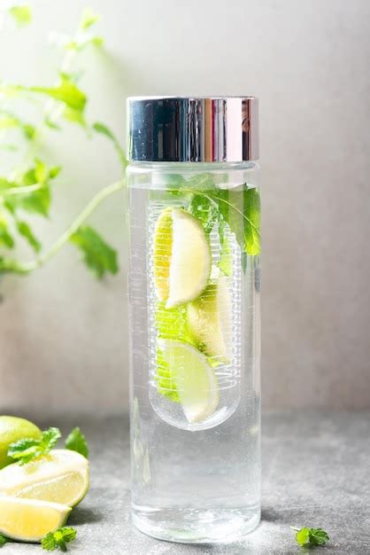 Premium Photo Infused Water With Lime And Mint In Special Bottle