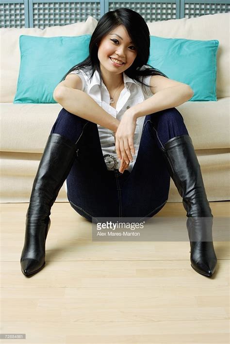 Young Woman Sitting On Floor Legs Apart Hands On Knees Sitting Pose Reference Sitting With