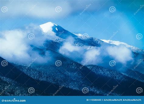 Beautiful Foggy Mountains High Peaks Covered With Snow And Ice Stock