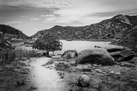 Rock Boulders On The Lake Shore · Free Stock Photo