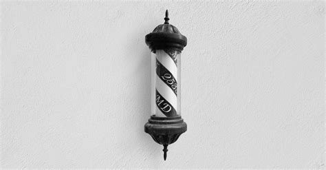 Black and White Barber's Pole On Wall · Free Stock Photo