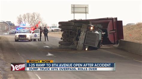 Dump Truck Hits I 25 Overpass Rolls Over Youtube