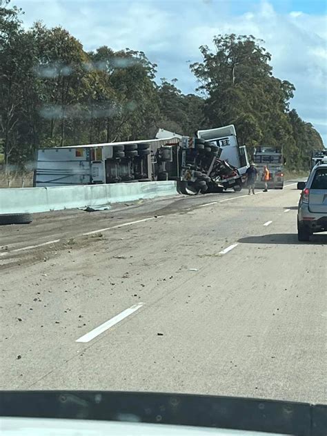 Pacific Hwy, Herons Creek: Crash after truck and car collide near Kew