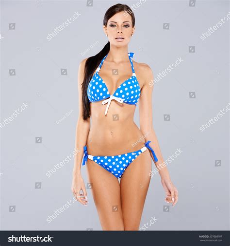 Sexy Brunette Posing Blue Swimsuit While Stock Photo Edit Now 207668707