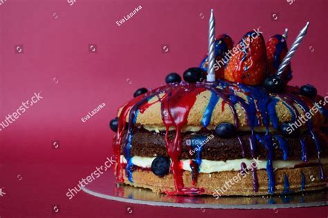 The Triple Layer Naked Cake With Small Blueberries Pressed Along