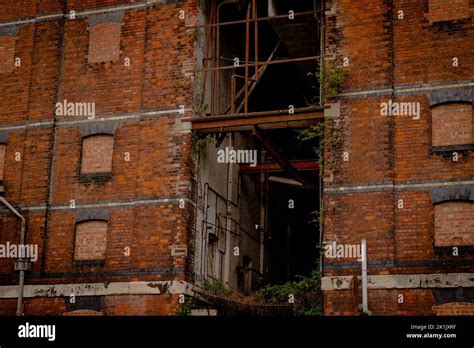 An Old Abandoned Red Brick Building In Gloucester Docks United Kingdom