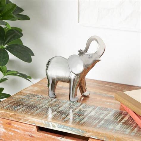 Litton Lane 4 In X 10 In Silver Ceramic Standing Elephant Sculpture