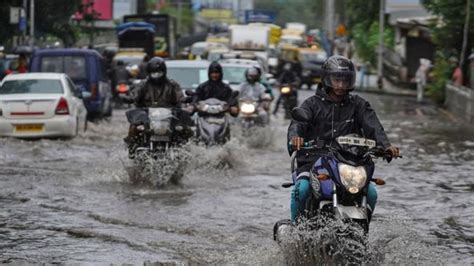 Weather Updates Heavy Rains Batter Gujarat Yamuna Breaches Danger