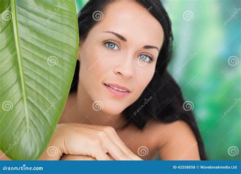 Beautiful Nude Brunette Smiling At Camera With Green Leaf Stock Photo Image Of Shoulders