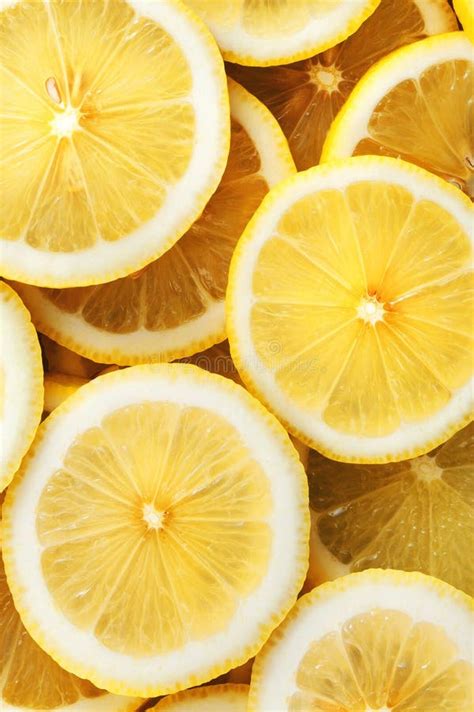 Sliced Lemons Background And Texture Vertical Color Photo Stock Image