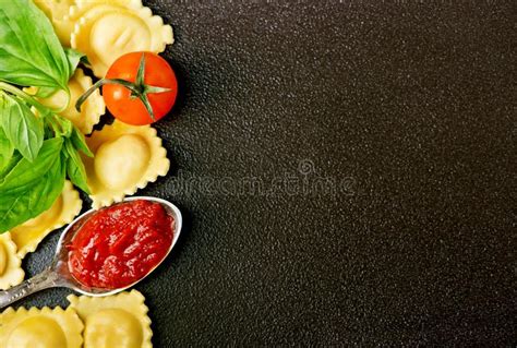 Ravioli With Tomato Sauce And Fresh Basil On A Plate Shot From The Top