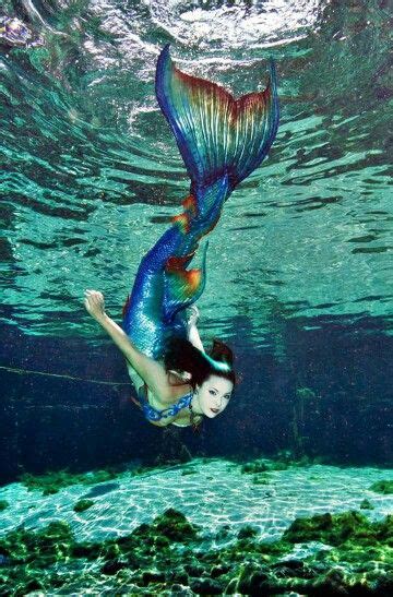 Pretty Mermaids Swimming