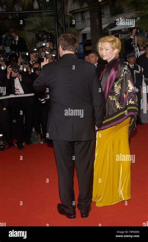 CANNES, FRANCE. May 22, 2004: QUENTIN TARANTINO & TILDA SWINTON at the awards gala for the 57th