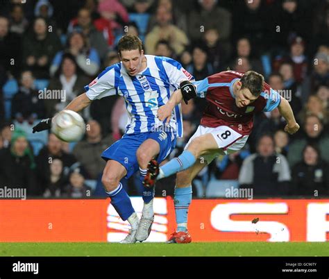 Aston villas james milner past brighton hove albions jim mcnulty hi-res ...