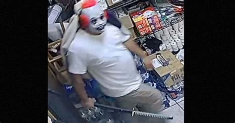 Chilling Footage Shows Man In Clown Mask Armed With Samurai Sword