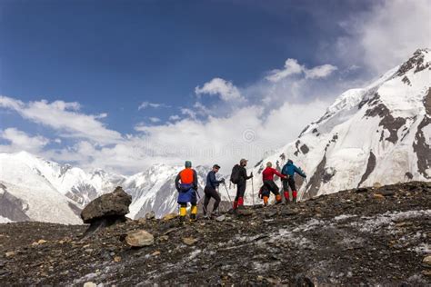 Mountaineers Walking Across Large Glacier Stock Image Image Of