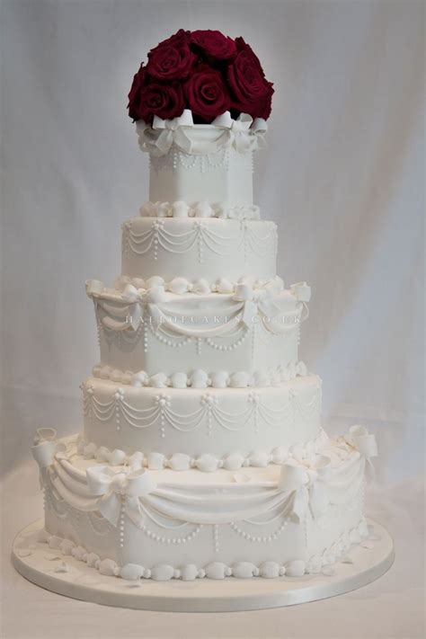 Pretty Victorian Style Wedding Cake With Fresh Flowers In Love With