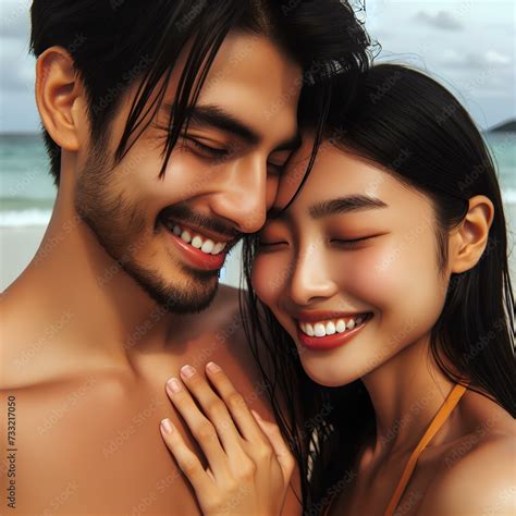 Portrait Of Couple At The Beach With Their Forehead Touching