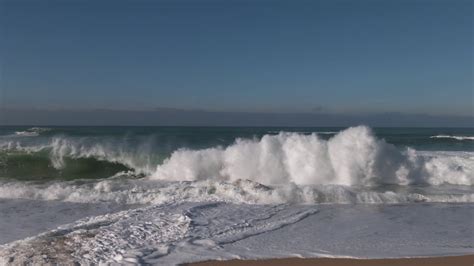 Ocean Waves Crashing On The Beach Continuous Shot Crashing Waves