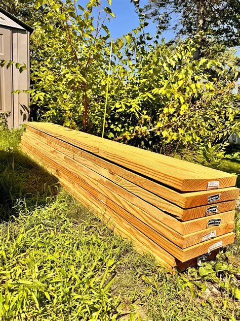 NEW 8 boards~ Pressure-treated wood~ 8 boards, 2x12 8 ft long. 5 boards