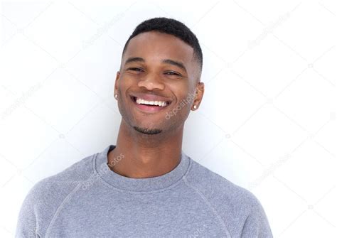 Handsome young black man laughing — Stock Photo © mimagephotos #51923375