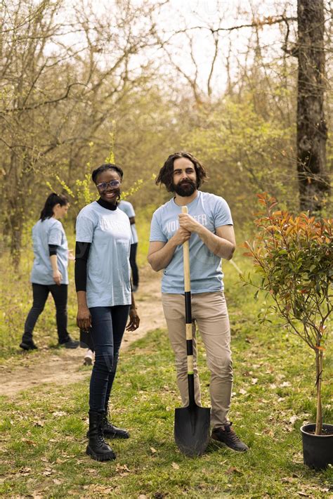 Portrait of diverse activists participating at conservation project