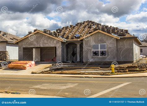 New One Story Home Construction With Recently Applied Stucco Stock