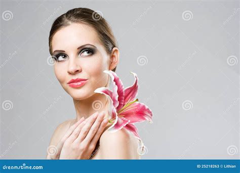 Striking Brunette Beauty With Colorful Lily Stock Image Image Of Relaxed Posing 25218263