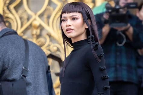 Zendaya Debuts Short Bangs In Dramatic Black Look At Paris Fashion Week