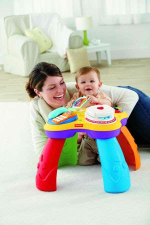 ''Волшебный'' столик: 4 игры для малыша. Fisher price развивающий столик