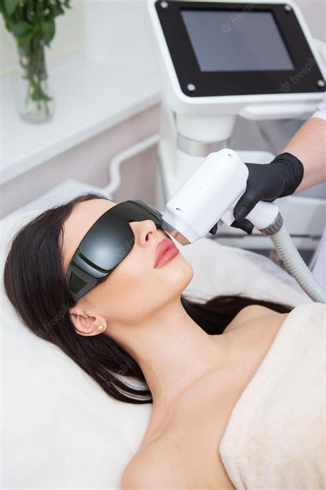 Premium Photo The Process Of Laser Hair Removal Of The Female Body Professional Cosmetology