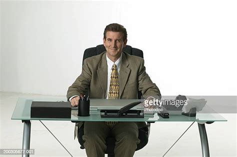 Person Behind Desk On White Photos And Premium High Res Pictures