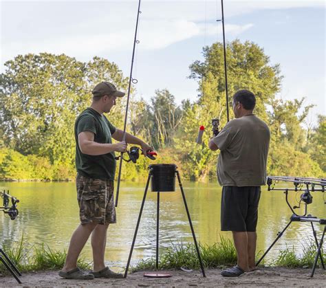 What is a spod – two men holding spod rods | Best of Angling