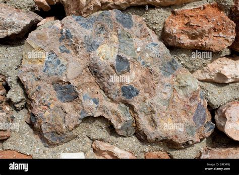 Breccia is a clastic sedimentary rock composed by broken fragments of ...