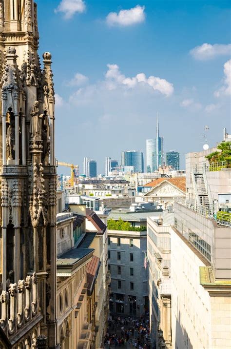 White Marble Statues On Roof Of Duomo Di Milano Cathedral Italy Stock