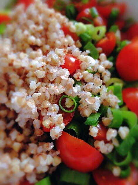 Premium Photo Close Up Of Buckwheat With Tomato