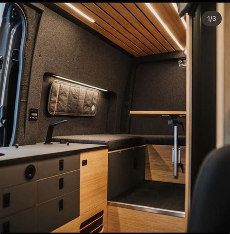 The Inside Of An Rv With Its Door Open And Storage Drawers In Place On