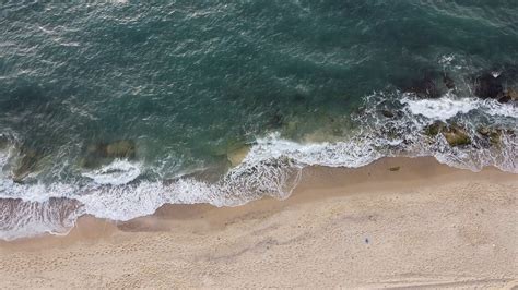 Drone Footage Of A Beach Shore · Free Stock Video