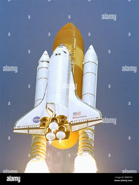 The Space Shuttle Discovery Lifts Off From Launch Complex 39b On