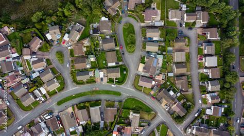 Top Down Aerial View Of Urban Houses And Streets In A Residential Area