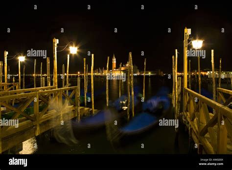 Gondolas at night, Venice, Italy Stock Photo - Alamy