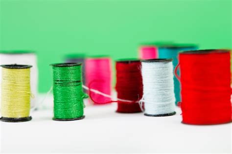 Premium Photo Colorful Spools Of Sewing Threads