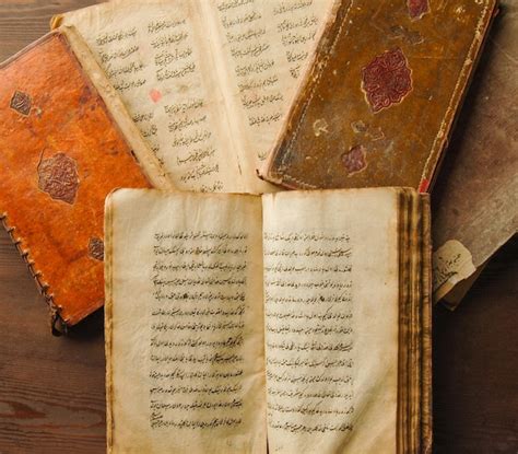 Premium Photo | Stack of open ancient books in arabic. old arabic ...