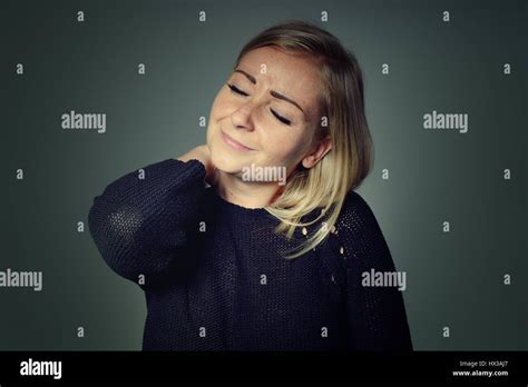 Woman With Neck Pain Stock Photo Alamy