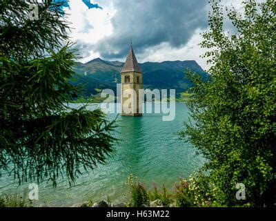 The old church tower of Reschen in the reservoir Lake Reschen, Italy Stock Photo: 96308178 - Alamy