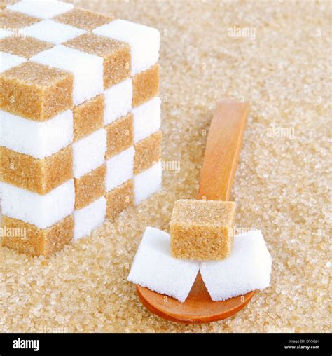 A Spoonful Of Sugar Cubes Stock Photo Alamy