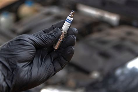 how much to replace spark plug